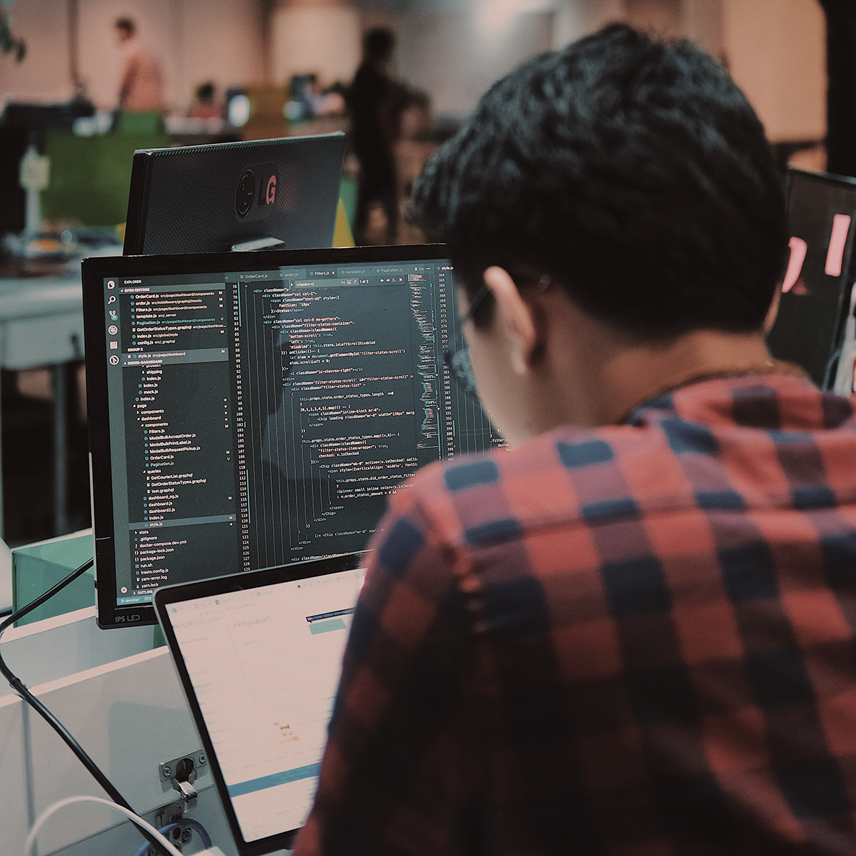 Developer coding in his MacBook