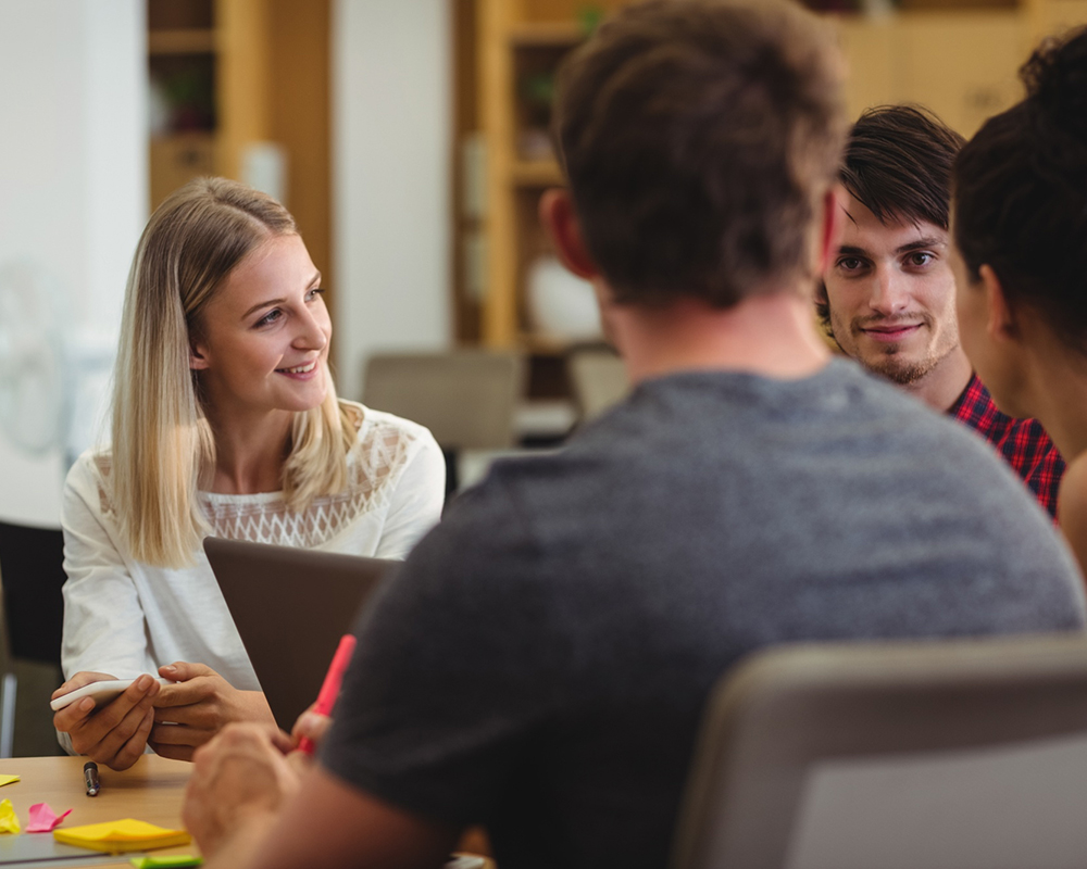Workers attending a meeting